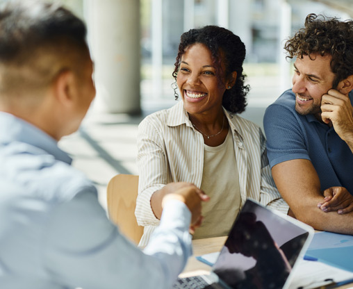 couple-discussing-life-insurance-with-agent